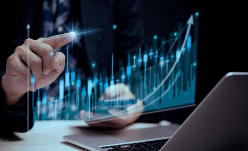 finger touching blue hologram forex chart