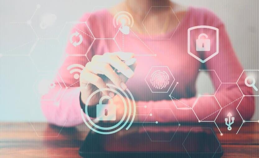 woman with pen pointing at trading data