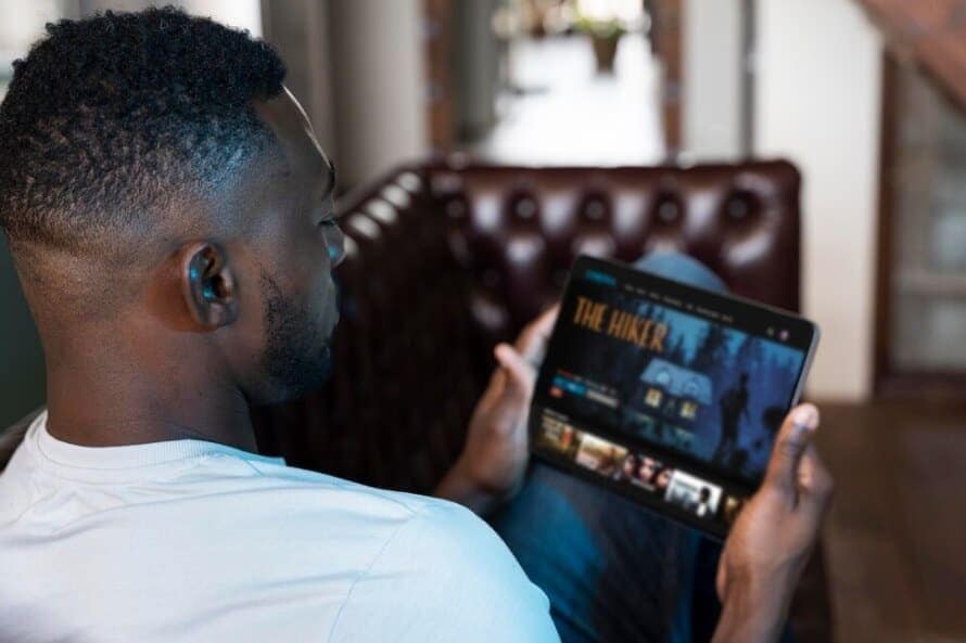 man watching forex movies